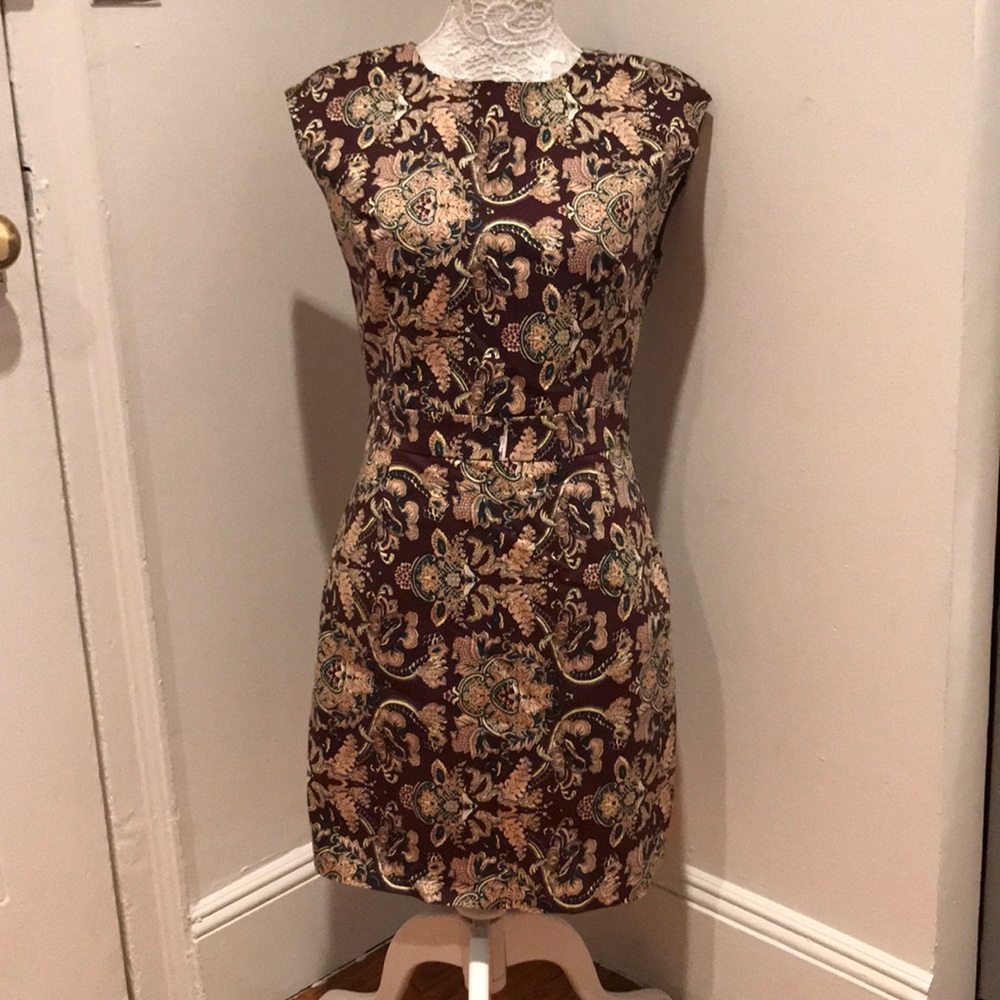 NWT maroon knee length dress with floral pattern.
